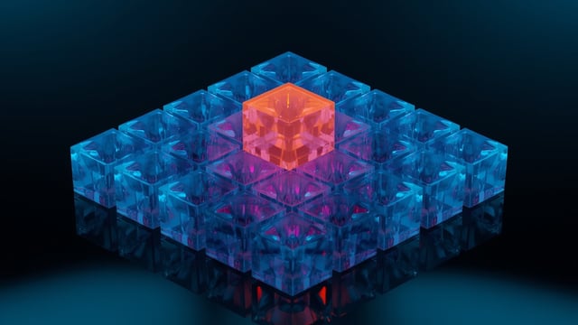 Abstract 3D render of an ordered grid of blue glass cubes with one glowing orange at the centre